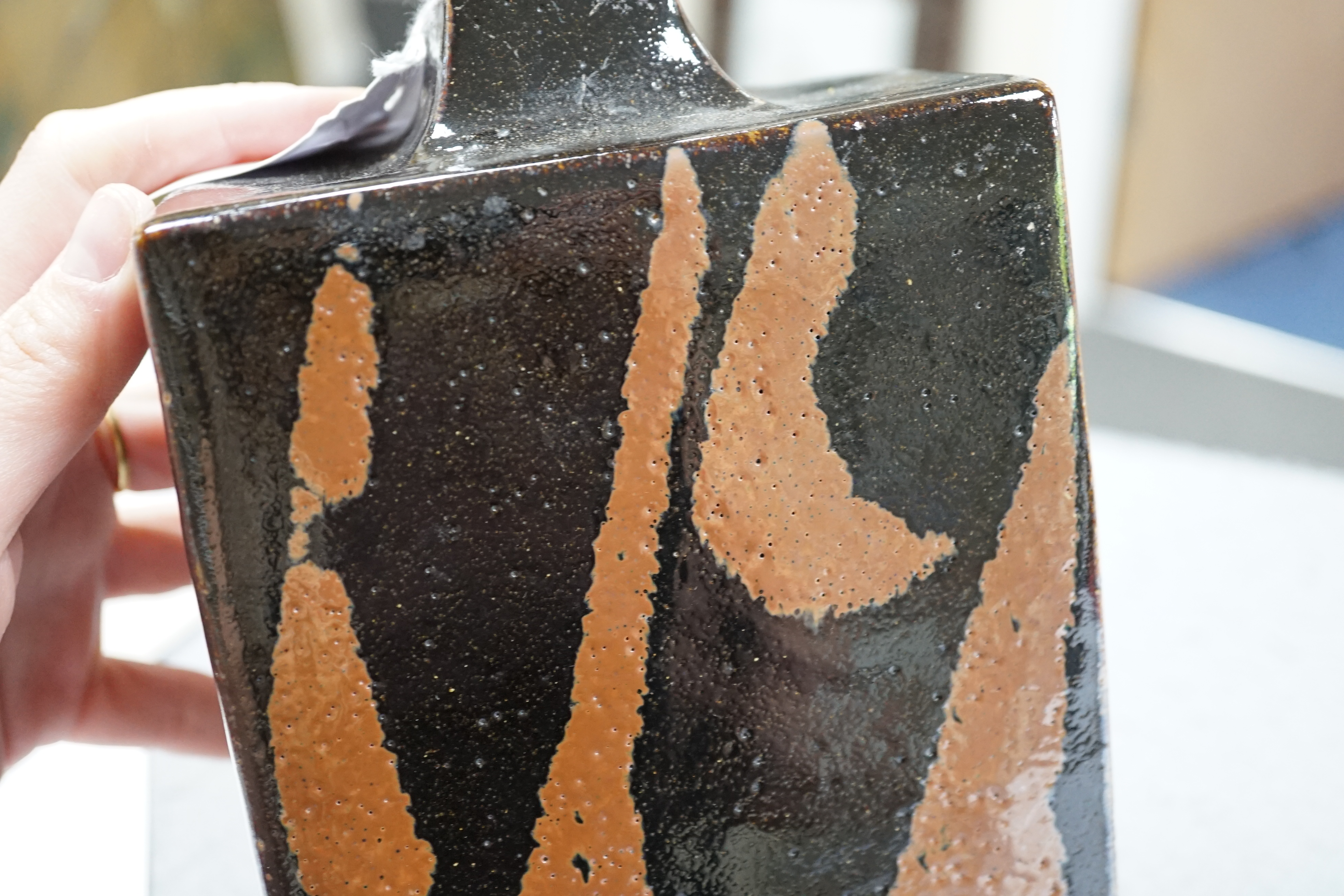 Attributed to Shoji Hamada (1894-1978), a tenmoku glazed bottle vase